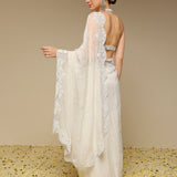 Back view highlighting the scalloped border of Neha Gursahani saree