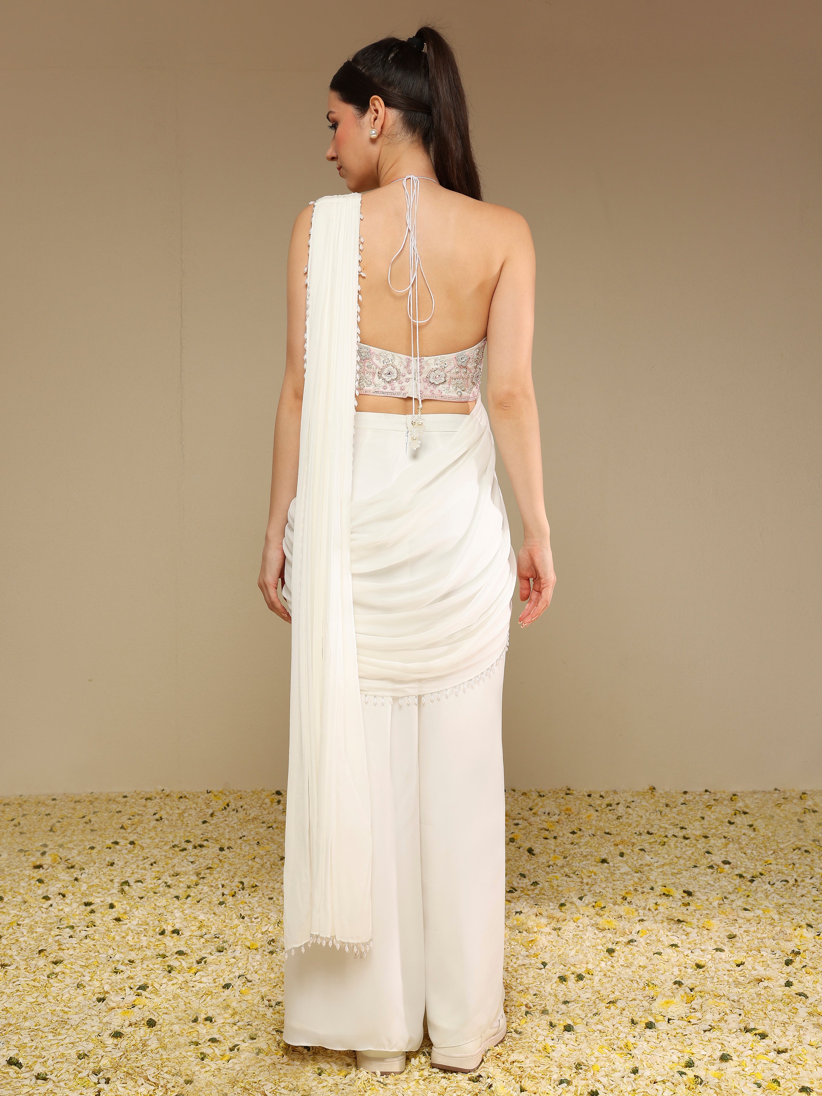 Back view of ivory predraped pant saree set