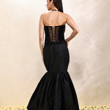Back view of full outfit showing voluminous taffeta balloon skirt and black corset
