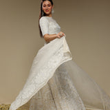 Side view of ivory embroidered lehenga set