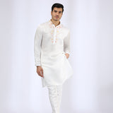 Embroidered Ivory Kurta teamed with matching Narrow Pants
