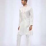 Embroidered Ivory Kurta teamed with matching Narrow Pants