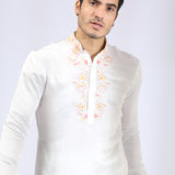 Embroidered Ivory Kurta teamed with matching Narrow Pants