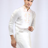 Embroidered Ivory Kurta teamed with matching Narrow Pants