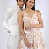 Ivory 3-D embroidered gown & Embroidered Ivory Kurta teamed with matching narrow pants