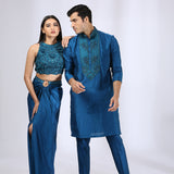 Peacock Blue Halter top teamed with a draped skirt & Peacock Blue kurta teamed with narrow pants