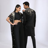 Jet black jumsuit with an embroidered open jacket & Black Embroidered Kurta teamed with matching narrow pants - Couple Set