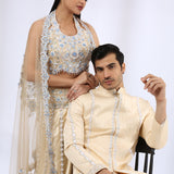 Nude Embroidered Lehenga Choli and Dupatta & Beige Embroidered sherwani with Matching Narrow Pants - Couple Set