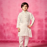 Embroidered Ivory Kurta teamed with matching narrow pants