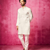 Embroidered Ivory Kurta teamed with matching narrow pants