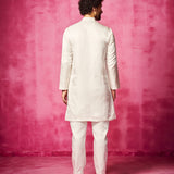 Embroidered Ivory Kurta teamed with matching narrow pants