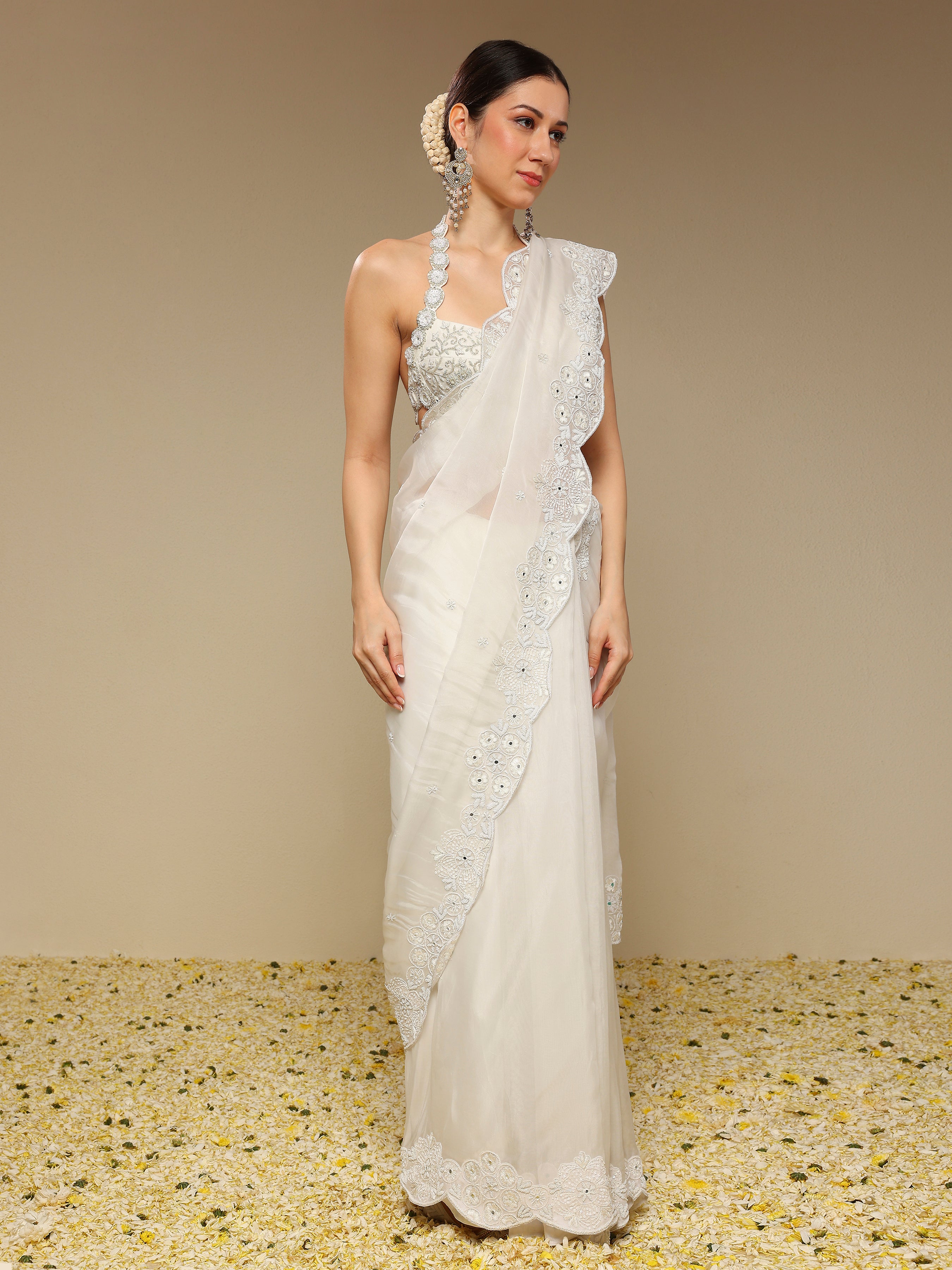 Side view of Neha Gursahani ivory scalloped saree for women
