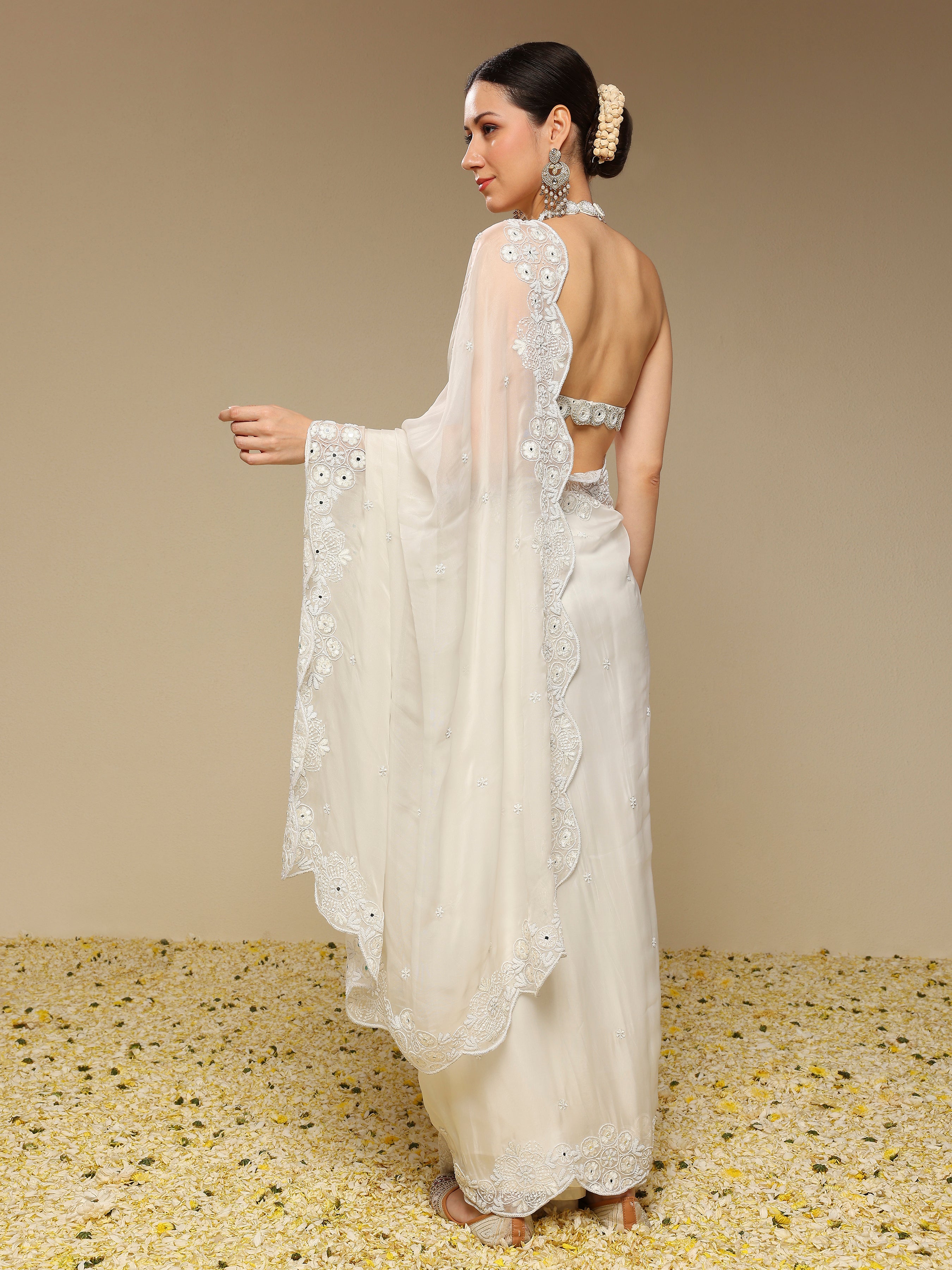Back view highlighting the scalloped border of Neha Gursahani saree