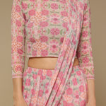 Close-up of printed design and embroidery detail on blouse