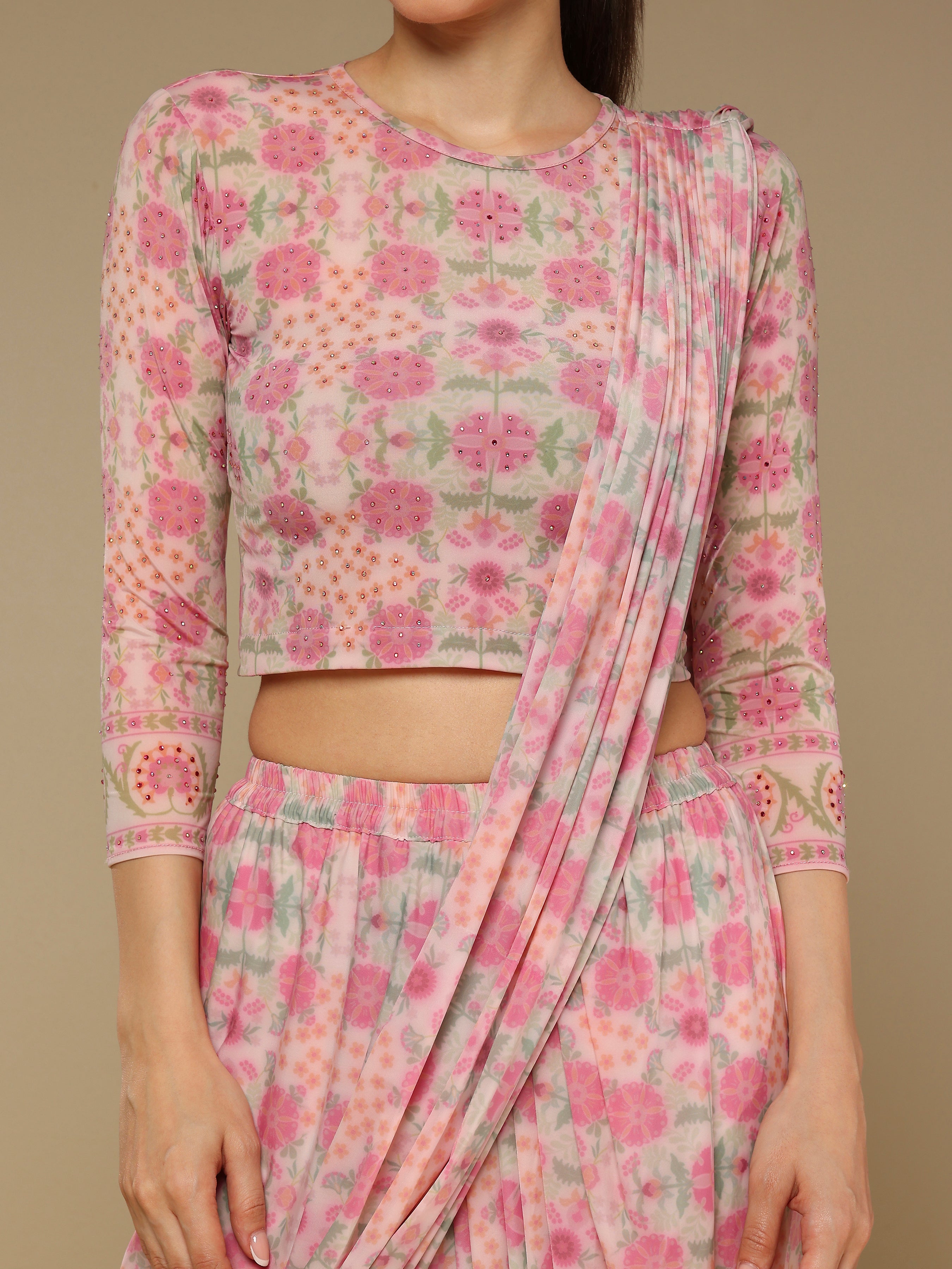 Close-up of printed design and embroidery detail on blouse