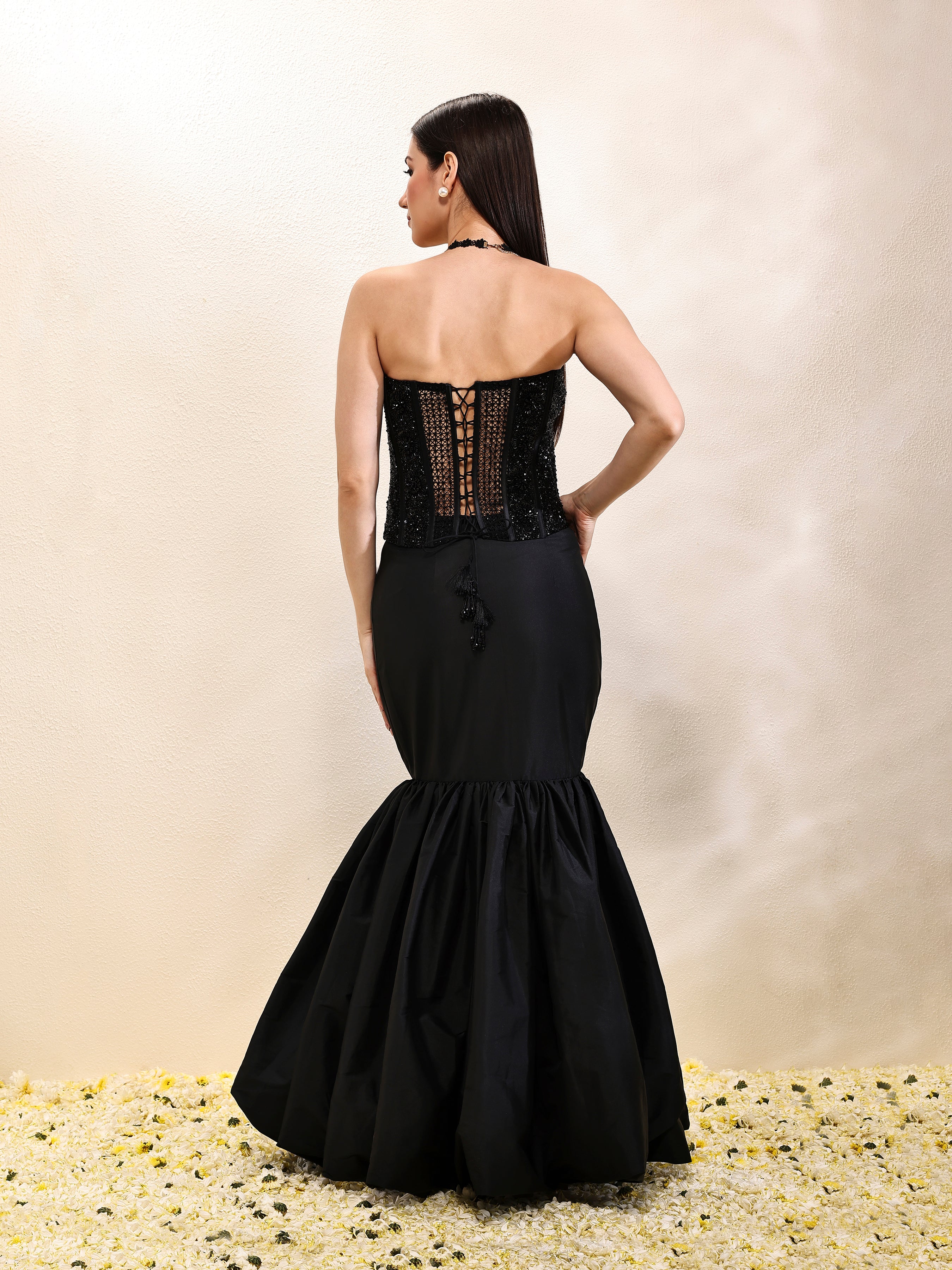 Back view of full outfit showing voluminous taffeta balloon skirt and black corset