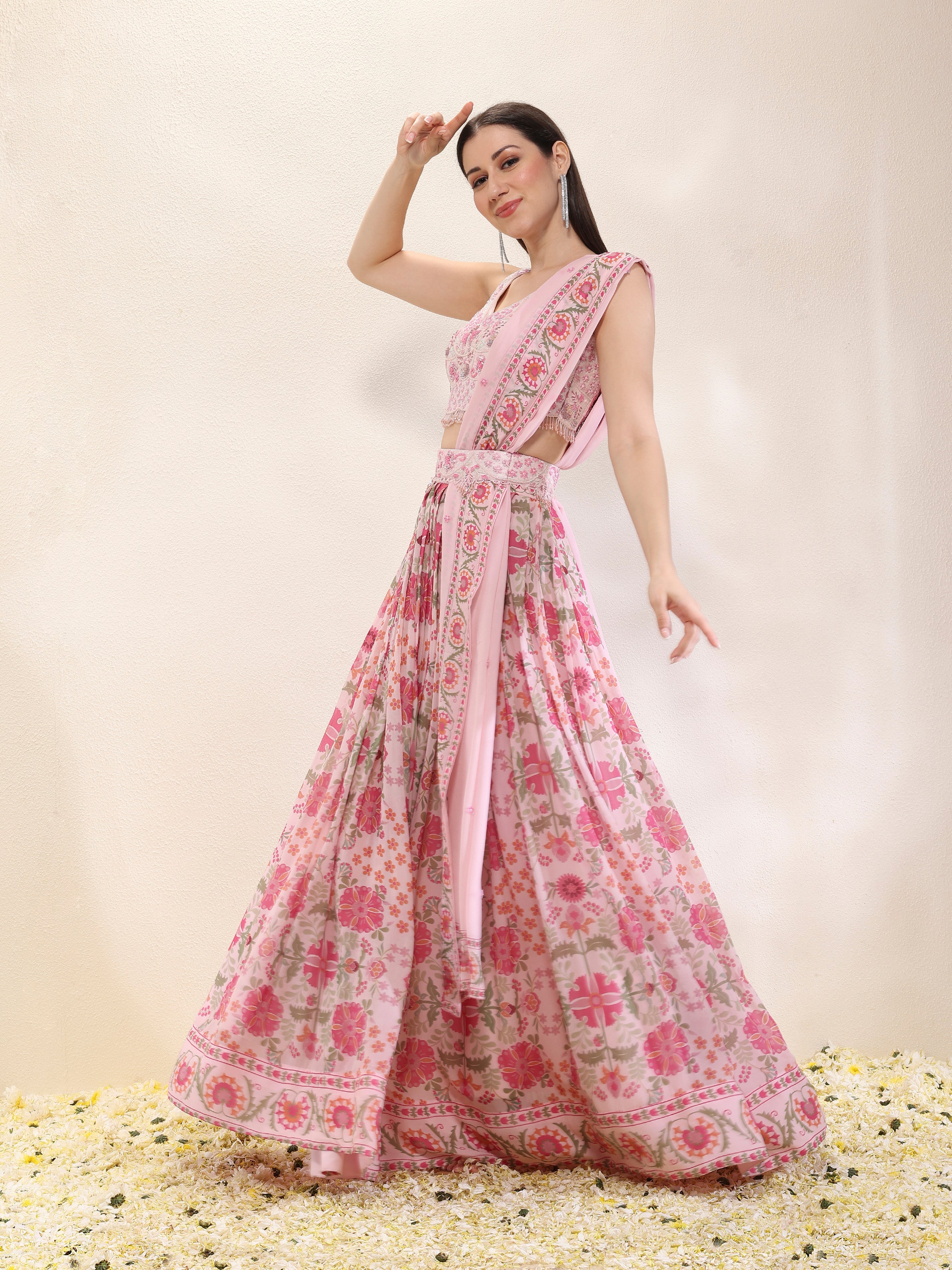Woman wearing a pink floral dress on a light background