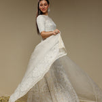 Side view of ivory embroidered lehenga set