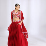 Bright Red Embroidered Choli teamed with a Pleated Lehenga and Dupatta