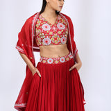 Bright Red Embroidered Choli teamed with a Pleated Lehenga and Dupatta