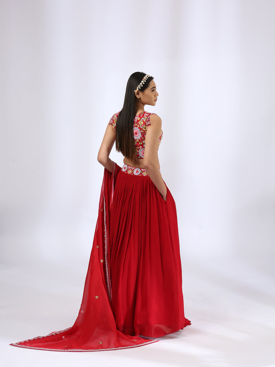 Bright Red Embroidered Choli teamed with a Pleated Lehenga and Dupatta