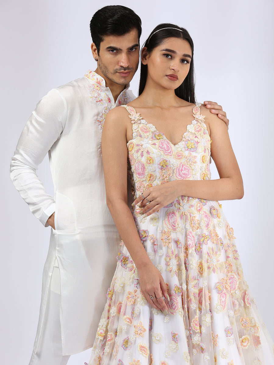 Ivory 3-D embroidered gown & Embroidered Ivory Kurta teamed with matching narrow pants