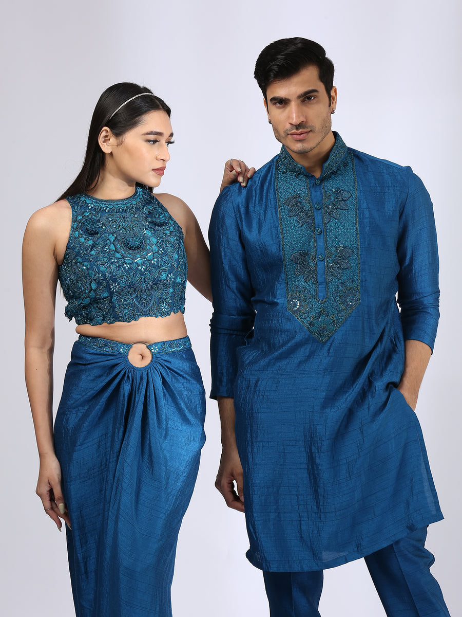 Peacock Blue Halter top teamed with a draped skirt & Peacock Blue kurta teamed with narrow pants