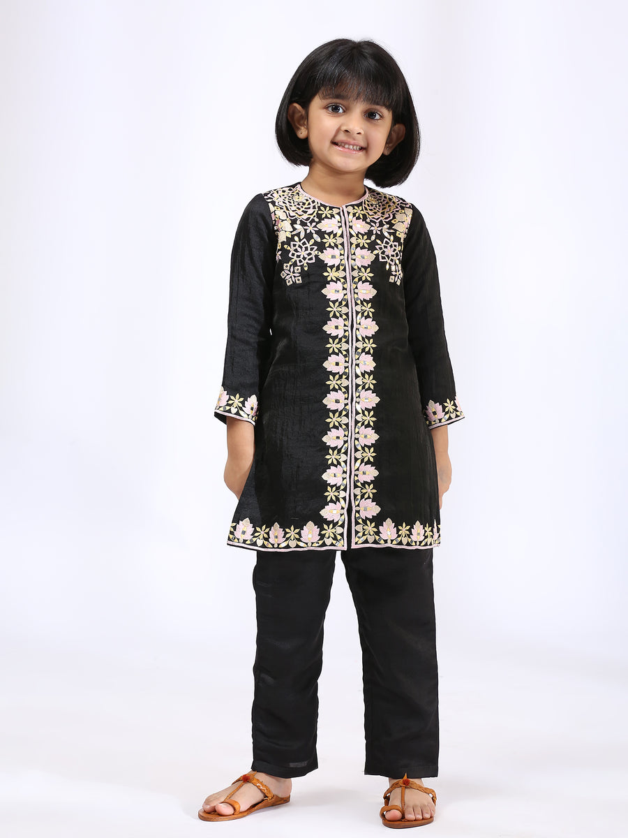 Jet black jumsuit with an embroidered open jacket paired with Black Embroidered Kurta teamed with matching narrow pants