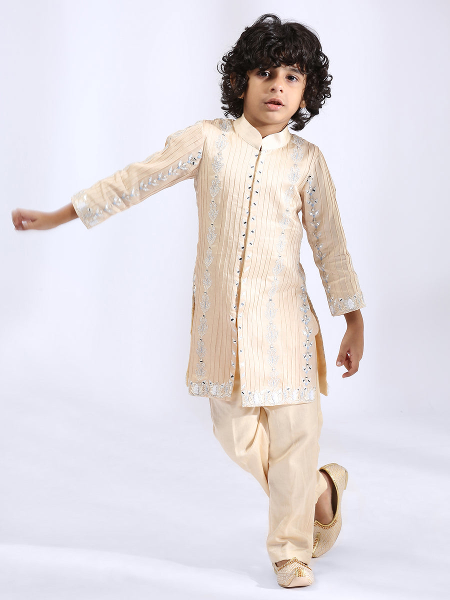 Beige Embroidered sherwani with matching narrow pants
