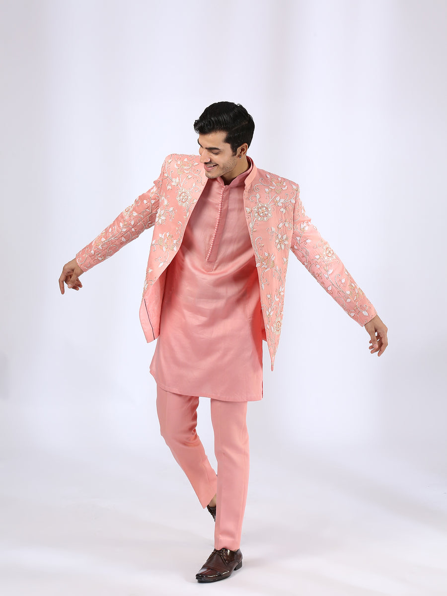 Peach Embroidered Jacket teamed with matching Kurta and Narrow Pants