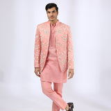 Peach Embroidered Jacket teamed with matching Kurta and Narrow Pants