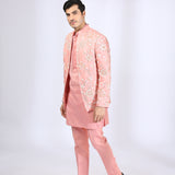 Peach Embroidered Jacket teamed with matching Kurta and Narrow Pants