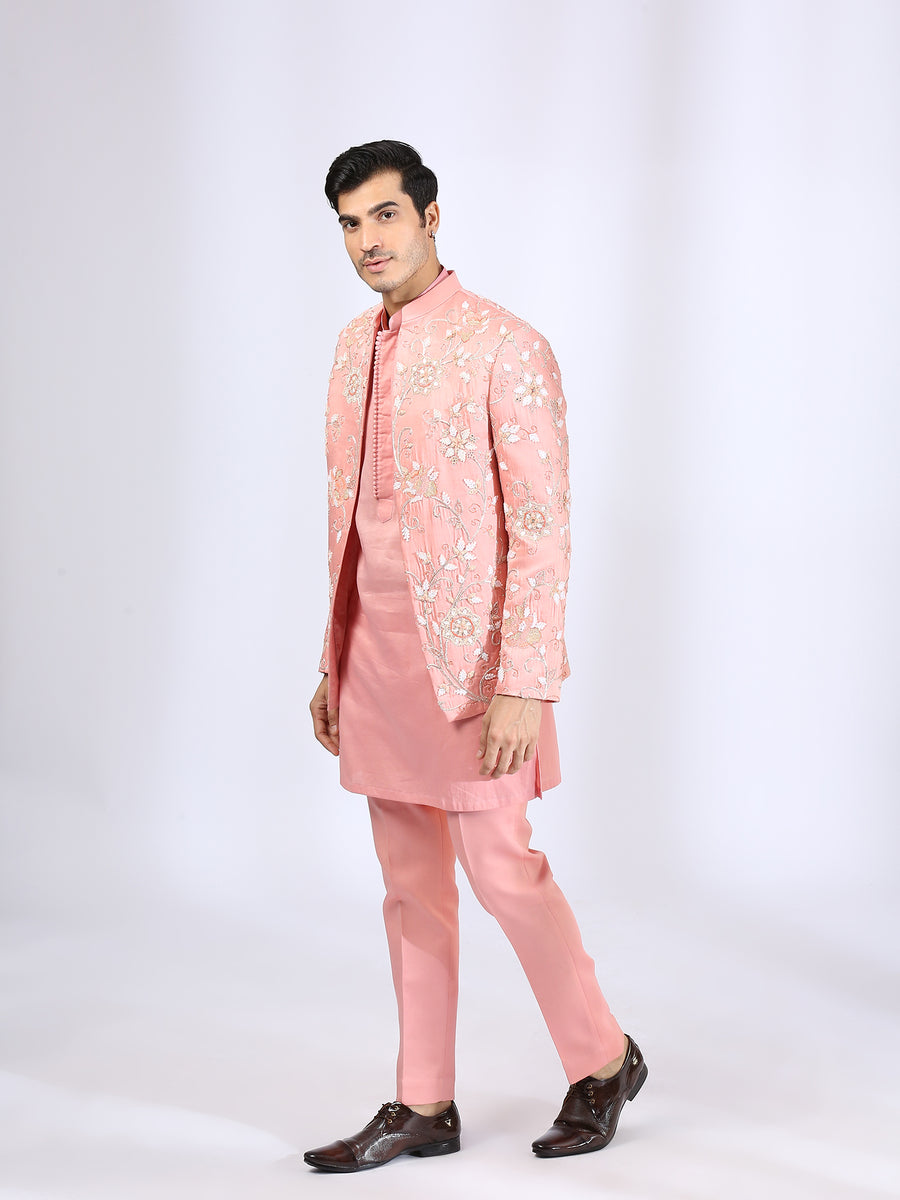Peach Embroidered Jacket teamed with matching Kurta and Narrow Pants