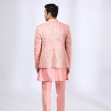 Peach Embroidered Jacket teamed with matching Kurta and Narrow Pants