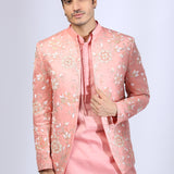 Peach Embroidered Jacket teamed with matching Kurta and Narrow Pants