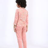 Peach Embroidered Jacket teamed with narrow pants