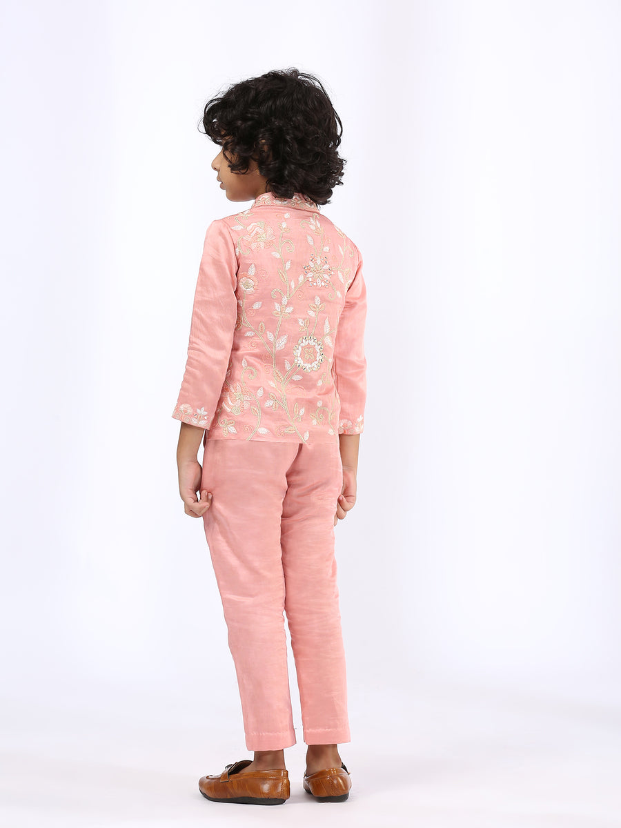 Peach Embroidered Jacket teamed with narrow pants